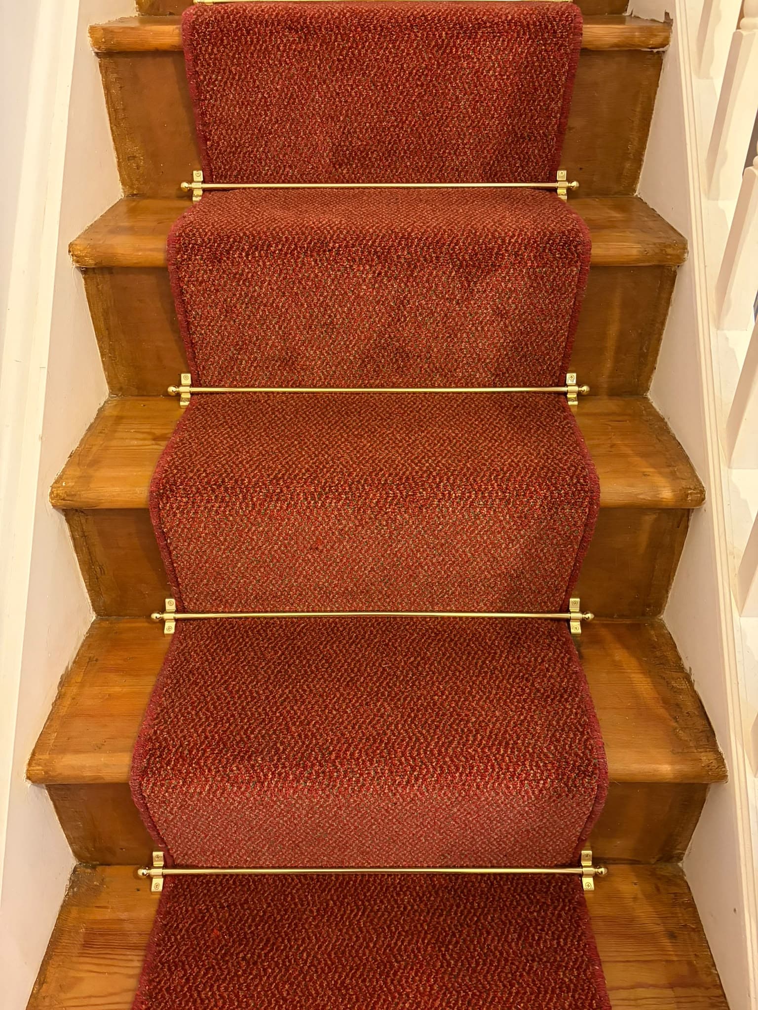 Rich Red Runner for a Classic Staircase